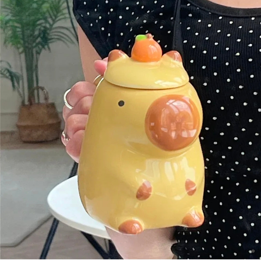 Tangerine-eating capybara mug (cup + lid)