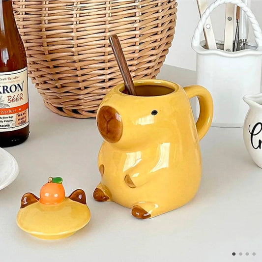 Tangerine-eating capybara mug (cup + lid)