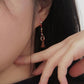 Song earrings