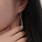 Song earrings